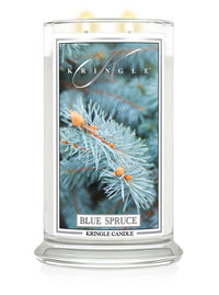 Kringle Candle Blue Spruce candle with a decorative label on a white background