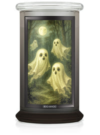 Candle with ghost design and 'BOO-WHOO' text on a white background
