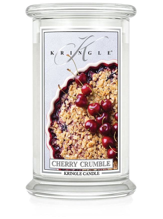 Kringle Candle with cherry crumble design on a white background