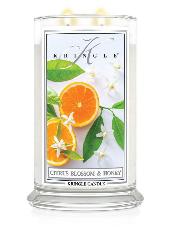 Kringle Candle with citrus blossoms and honey label on a white background