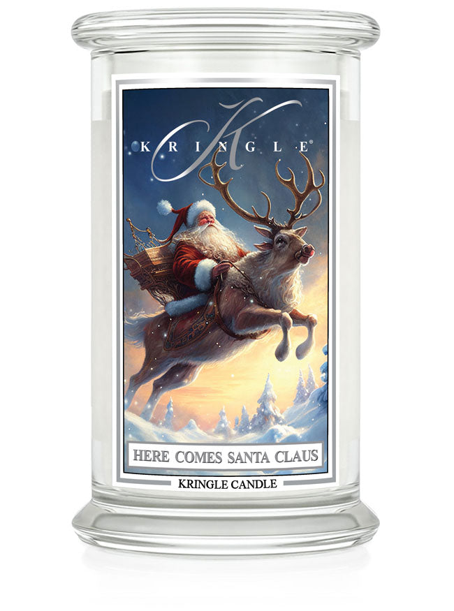 Kringle Candle with Santa Claus and reindeer design on a white background