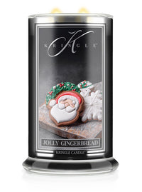 Kringle Candle with gingerbread man design on a white background