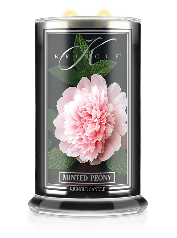 Kringle Candle Minted Peony lit candle with pink peony flower design on a white background
