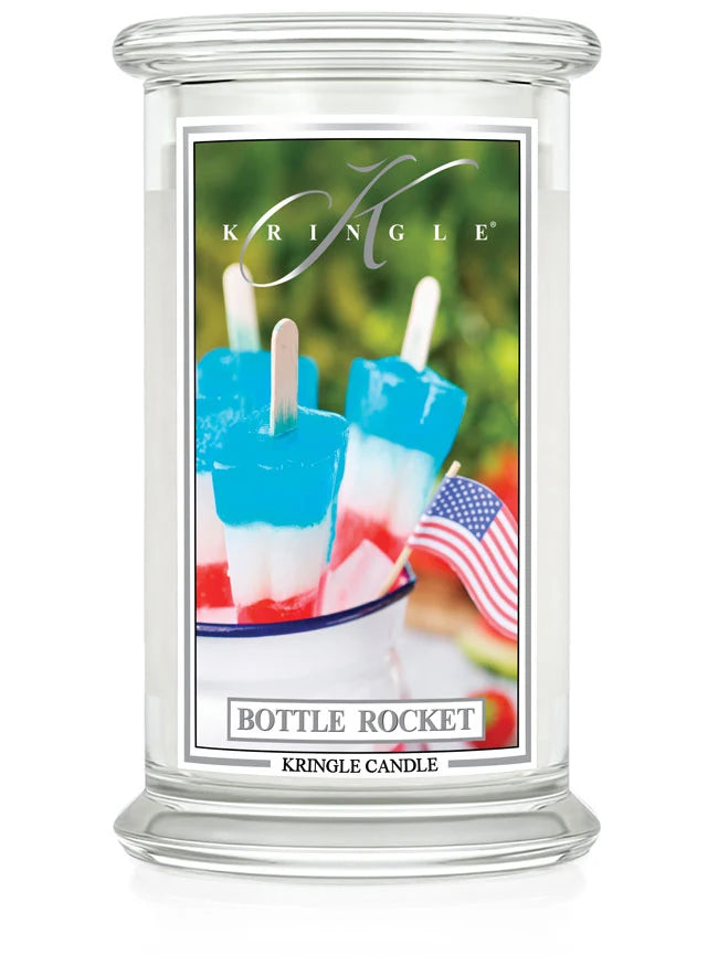 Kringle Candle’s Bottle Rocket jar with red, white, and blue popsicles and a small American flag on the label.