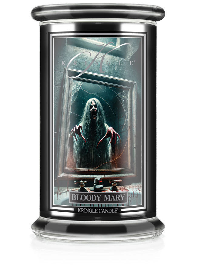 Unlit Reserve candle "Bloody Mary" with a label showing a spooky figure in a mirror, black surroundings.