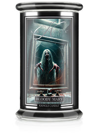 Unlit Reserve candle "Bloody Mary" with a label showing a spooky figure in a mirror, black surroundings.