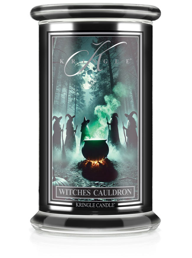 Unlit Halloween candle, "Witches Cauldron." Label shows witches around a steaming cauldron in a forest under a full moon.