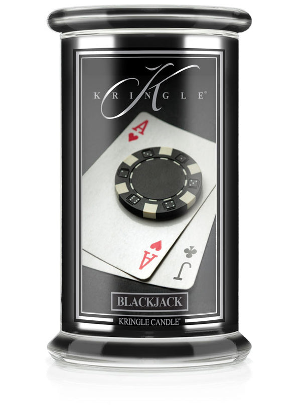 Jar candle of "Black Jack" unlit. Label shows a poker chip on ace of hearts and jack of clubs cards.