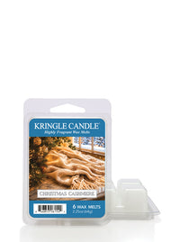 Kringle Candle Christmas Cashmere 6-wax melt package shown with the clear plastic clamshell container and three melted wax cubes on a white background.