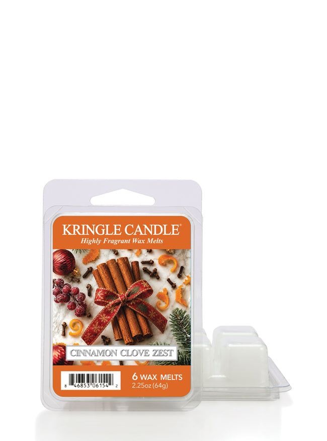 Kringle Candle Cinnamon Clove Zest 6-wax melts in a clear plastic clamshell package with an orange label, shown next to a single white wax melt tray on a white background.
