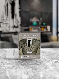 Kringle Candle wax melt package on a surface with a blurred background